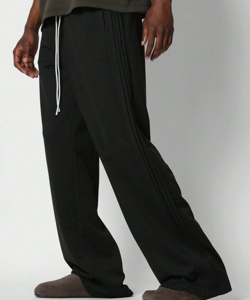 فلاينوف بنطال رجالي أسود سادة فضفاض مناسب للارتداء اليومي، بتصميم مريح - Image 2